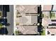 Aerial view of the neighborhood showing the home, rooftops, and street at 6964 Caldera St, Las Vegas, NV 89149