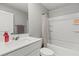 Stylish bathroom with a single vanity, a tub-shower combination, and neutral wall paint at 6964 Caldera St, Las Vegas, NV 89149