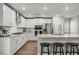 Well-appointed kitchen showcasing stainless steel appliances, granite countertops, and ample cabinet space at 6964 Caldera St, Las Vegas, NV 89149