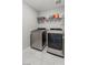 A practical laundry room with stainless steel washer and dryer at 6964 Caldera St, Las Vegas, NV 89149