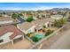 This backyard features a pool and lounge area perfect for relaxing or entertaining guests at 703 Jane Eyre Pl, Henderson, NV 89002