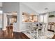 Dining room showcases an open concept to the kitchen and living spaces at 703 Jane Eyre Pl, Henderson, NV 89002
