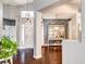 Inviting home foyer featuring hardwood floors and decorative light fixtures, leads into main living areas at 703 Jane Eyre Pl, Henderson, NV 89002