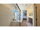 Elegant bathroom with soaking tub, glass shower, and a view into the bedroom at 739 Wild Highlands Ln, Henderson, NV 89015