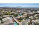 Aerial view of a residential neighborhood showcasing manicured landscaping and community pools at 741 Wildwood Beach Ave, Henderson, NV 89052