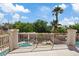 Upper deck view of the beautiful pool and lush landscaping in the backyard at 741 Wildwood Beach Ave, Henderson, NV 89052