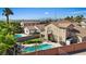 A backyard with a private pool, offering a relaxing outdoor living space at 741 Wildwood Beach Ave, Henderson, NV 89052