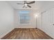 Empty bedroom with wood floors, natural light, and closet at 741 Wildwood Beach Ave, Henderson, NV 89052