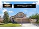 Charming two-story home featuring a three-car garage and well-maintained landscaping at 741 Wildwood Beach Ave, Henderson, NV 89052