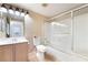 Well-lit bathroom featuring a shower-over-tub combination with sleek sliding doors at 7450 S Eastern Ave # 1058, Las Vegas, NV 89123