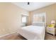 Cozy bedroom features neutral walls, carpet, mirrored closet, and natural light at 7450 S Eastern Ave # 1058, Las Vegas, NV 89123
