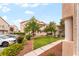 Attractive condo building featuring well-maintained landscaping and ample parking at 7450 S Eastern Ave # 1058, Las Vegas, NV 89123