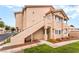 Charming condo building with well-maintained landscaping and an inviting entrance at 7450 S Eastern Ave # 1058, Las Vegas, NV 89123