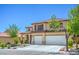 Beige two-story home with tile roof, brown shutters, a two-car garage and manicured front lawn at 7619 Comanche Canyon Ave, Las Vegas, NV 89113