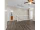 Upstairs loft space featuring wood floors, neutral paint, and natural light at 7818 Brodie Castle Ct, Las Vegas, NV 89166