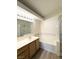 Bathroom featuring a shower and bathtub at 7830 Foxwood Pl # 7830, Las Vegas, NV 89145