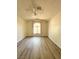 Spacious bedroom with vaulted ceilings and neutral paint at 7830 Foxwood Pl # 7830, Las Vegas, NV 89145