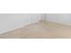 Neutral bedroom featuring tan carpeting and white doors at 786 Craigmark Ct, Henderson, NV 89002