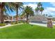 Palm Hills community entrance with lush landscaping and a welcoming sign on artificial turf at 786 Craigmark Ct, Henderson, NV 89002
