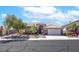 Charming single-story home with a well-maintained front yard and a two-car garage at 786 Craigmark Ct, Henderson, NV 89002