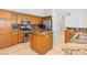 Updated kitchen with granite counters, stainless steel appliances, and a central island at 786 Craigmark Ct, Henderson, NV 89002