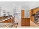 Spacious kitchen featuring granite countertops, stainless steel appliances, and ample storage space at 786 Craigmark Ct, Henderson, NV 89002