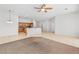 View of the open-concept living room and dining area with tile flooring at 786 Craigmark Ct, Henderson, NV 89002