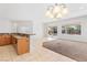 Bright open living space with granite counters, tile floor and access to the backyard pool at 786 Craigmark Ct, Henderson, NV 89002