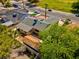 Bird's eye view of a cozy home featuring a detached garage and desert landscaping at 809 Greenbrook St, Las Vegas, NV 89110
