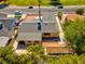 Aerial perspective showing a home with mature trees, detached garage, and easy-care yard at 809 Greenbrook St, Las Vegas, NV 89110