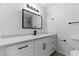 Updated bathroom with modern vanity, stylish mirror, and sleek lighting fixtures at 809 Greenbrook St, Las Vegas, NV 89110