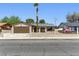 Charming single-story home with a desert landscaped front yard and a spacious driveway at 809 Greenbrook St, Las Vegas, NV 89110