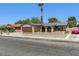Inviting single-story home with low-maintenance desert landscaping and a private, gated front yard at 809 Greenbrook St, Las Vegas, NV 89110