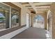 Charming covered patio with decorative arches, providing a welcoming outdoor space at 809 Greenbrook St, Las Vegas, NV 89110