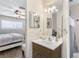 Bathroom with modern fixtures and a vanity mirror located next to the bedroom at 824 Antigua St, Las Vegas, NV 89145