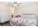 Bright bedroom with a ceiling fan and a glimpse into the en-suite bathroom at 824 Antigua St, Las Vegas, NV 89145