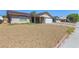 View of the home with low-maintenance landscaping at 824 Antigua St, Las Vegas, NV 89145