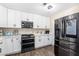 Beautiful kitchen featuring stainless steel appliances, white cabinets, and ample counter space at 824 Antigua St, Las Vegas, NV 89145