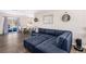 Inviting living room with stylish, comfortable, blue seating and modern decor at 824 Antigua St, Las Vegas, NV 89145