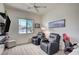 Comfortable bedroom featuring a ceiling fan, recessed lighting, and modern floors at 83 Buckthorn Ridge Ct, Las Vegas, NV 89183