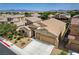 Beautiful single-Gathering home showcasing a well-manicured lawn and a three-car garage at 83 Buckthorn Ridge Ct, Las Vegas, NV 89183