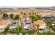 Stunning aerial view of the home with solar panels, a community pool, and lush landscaping at 8484 Montana Stream Ave, Las Vegas, NV 89113