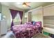 Bedroom features carpet flooring, window, murphy bed, and a dresser at 8484 Montana Stream Ave, Las Vegas, NV 89113
