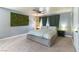 Bedroom with green accent wall and modern decor at 8484 Montana Stream Ave, Las Vegas, NV 89113