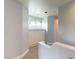 Bright hallway features a built-in cabinet and a window overlooking the front yard at 8484 Montana Stream Ave, Las Vegas, NV 89113