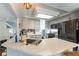 Well-lit kitchen with a view of the staircase, stainless steel appliances, and plenty of counter space at 8484 Montana Stream Ave, Las Vegas, NV 89113