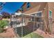 Beautiful backyard with an enclosed animal space perfect for enjoying time outdoors at 889 Harbor Ave, Henderson, NV 89002