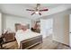 Bedroom with fan, plush bed, and coordinated furniture, designed for relaxation at 8953 Paige Rene Ct, Las Vegas, NV 89117