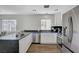 Bright kitchen features modern stainless steel appliances, and a breakfast bar at 8953 Paige Rene Ct, Las Vegas, NV 89117