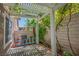 Private backyard space with patio and lush greenery at 9357 Golden Timber Ln, Las Vegas, NV 89117